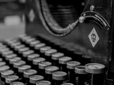 typewriter-407695_1920-e1587390980675-darken
